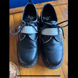Dr. Martens oxfords with white buckle strap
